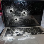 macbook_luodinreikkiä macbook_luodinreikkiä