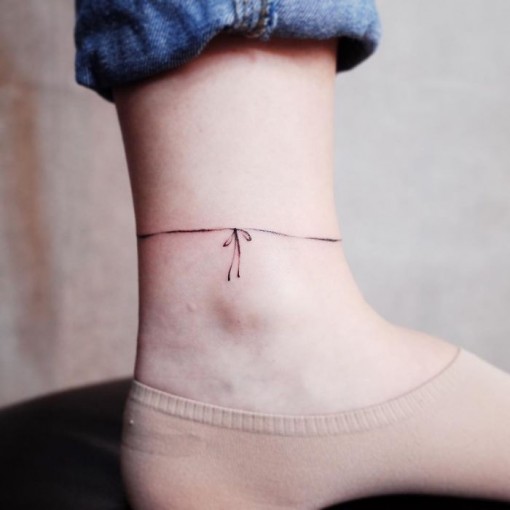 Witty Button Tattoo
