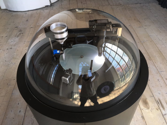 Pareidolia, face detection on grains of sand, installation
